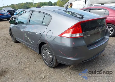 2010 Honda Insight Lx z USA, uszkodzony, nr VIN JHMZE2H50AS042743